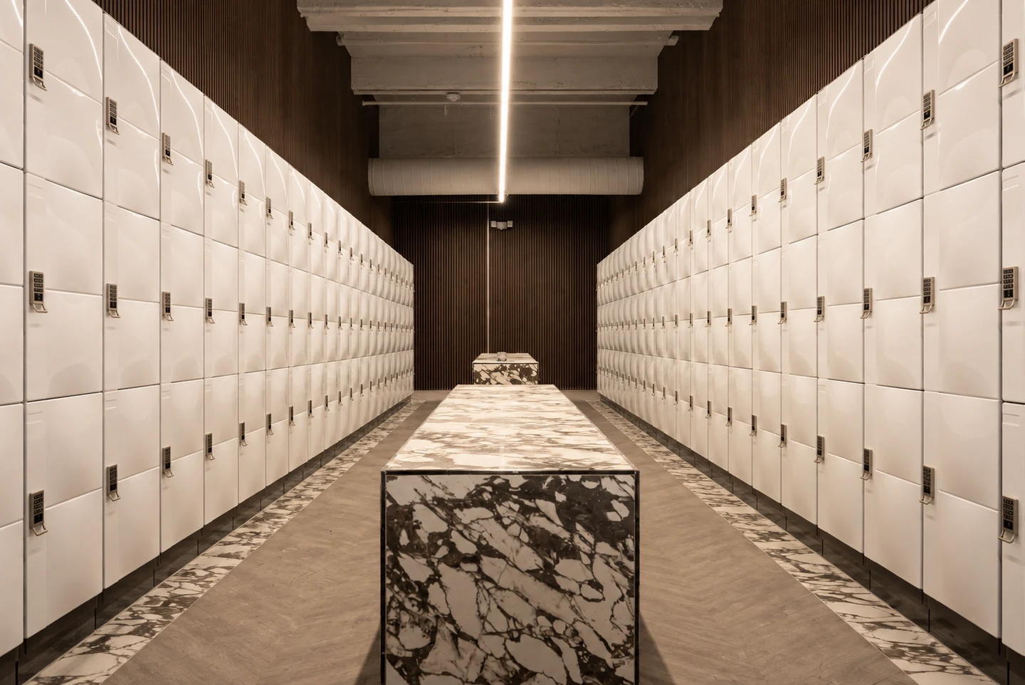Fusion Gyms locker room with marble benches